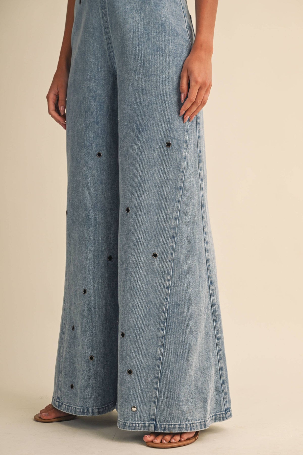 Denim Jumpsuit with Grommet Details
