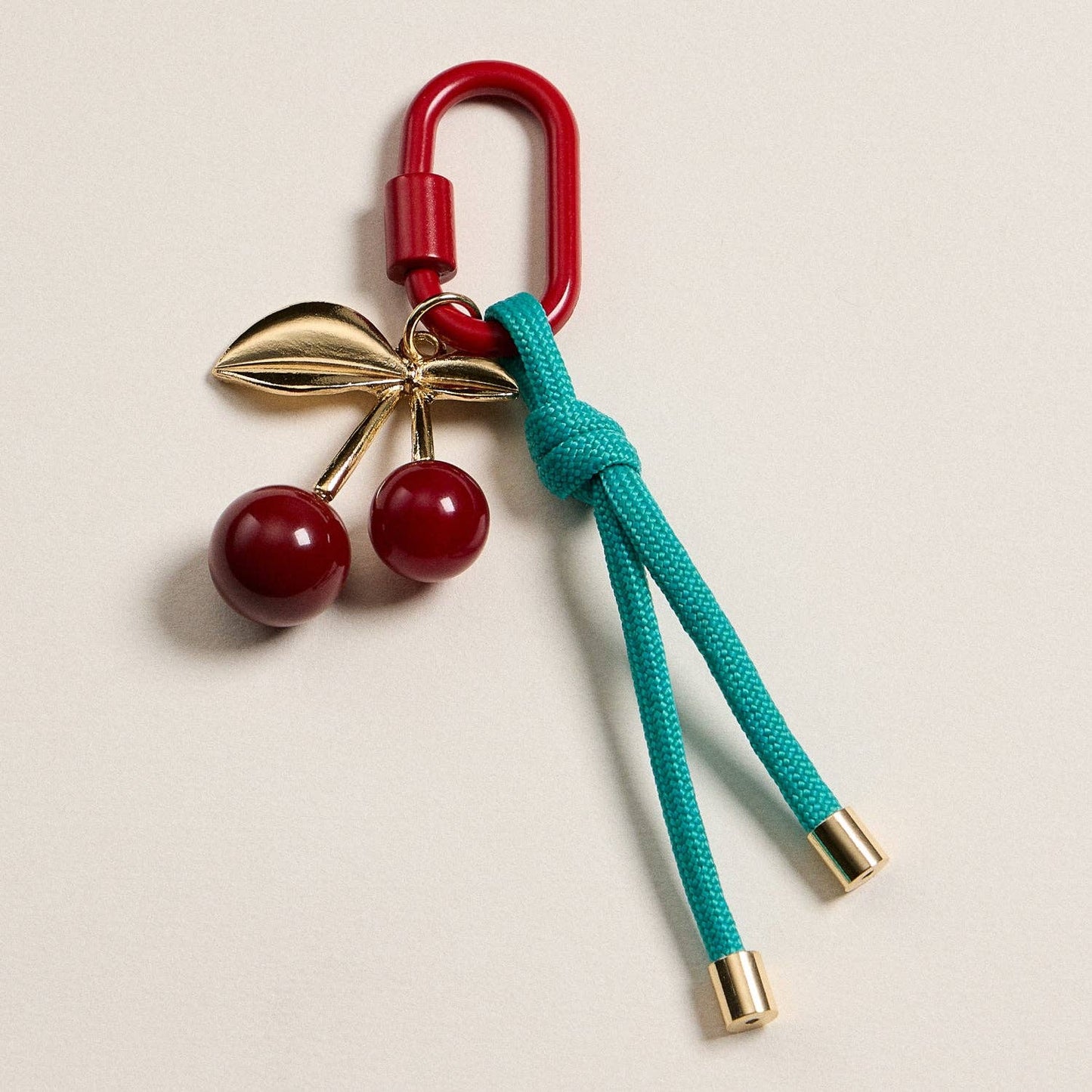 Gold-Tone Cherry Enamel Keychain | Braided Rope Detail